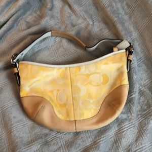 Used yellow coach hobo purse